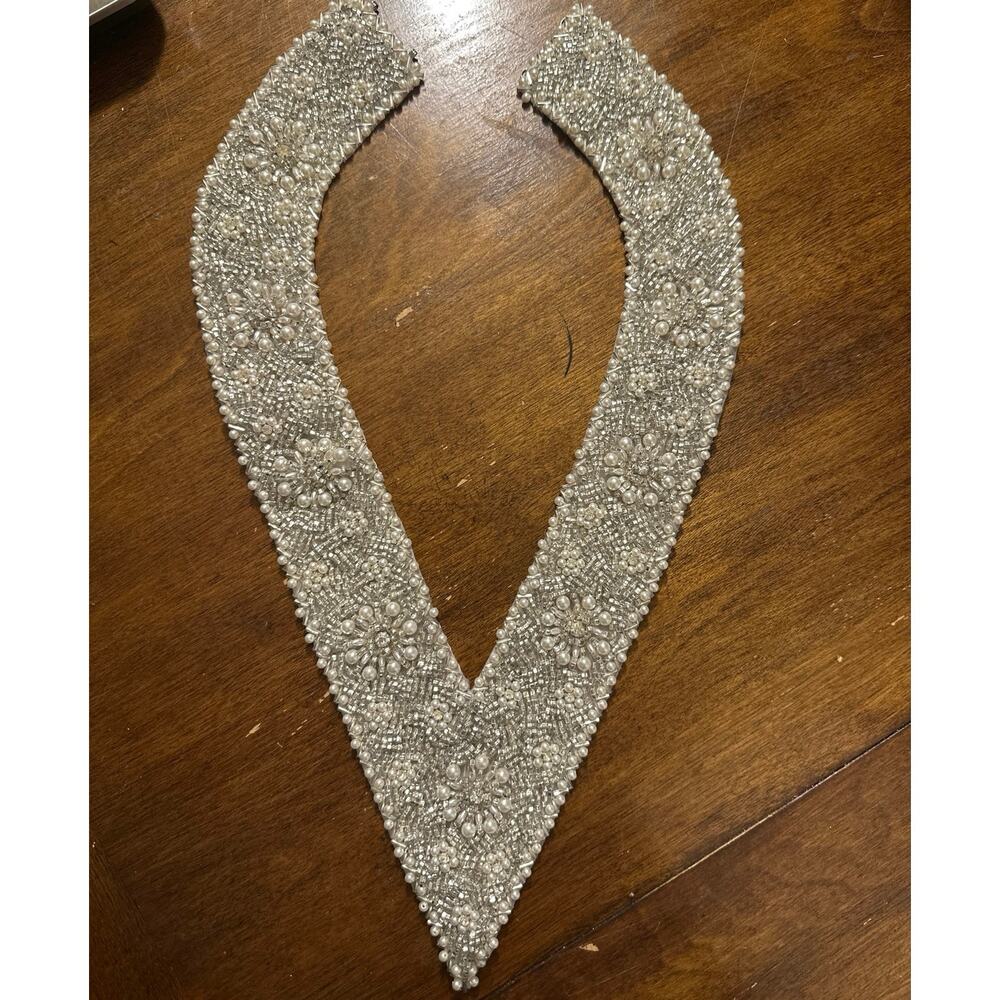 Vintage V-shaped neck oplaque sew on color for wedding or formal gown.
